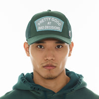 Good at Bad Decisions Trucker Hat (Bayberry)