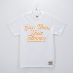 GIVE THEM THEIR FLOWERS SPELL OUT TEE WHITE