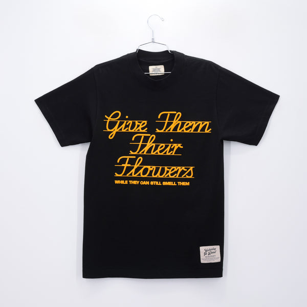 GIVE THEM THEIR FLOWERS SPELL OUT TEE BLACK